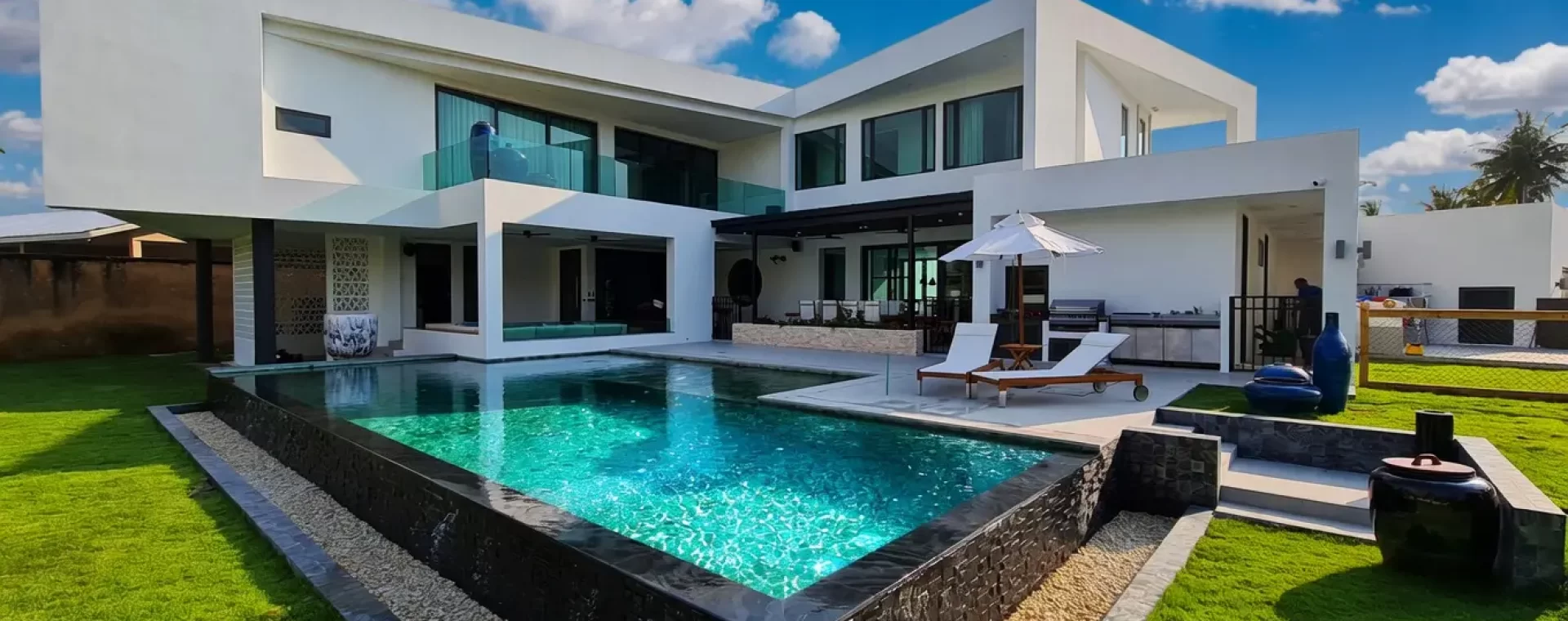 Modern luxury white villa with infinity-style pool completed in 2020 near Maprachan Lake, Pong, Bang Lamung, Chonburi
